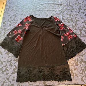 Small black lacy blouse with pink/red butterfly sleeves